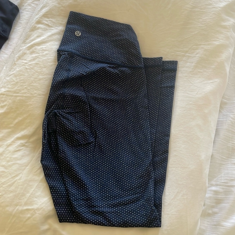Navy blue Lululemon leggings with polka dots